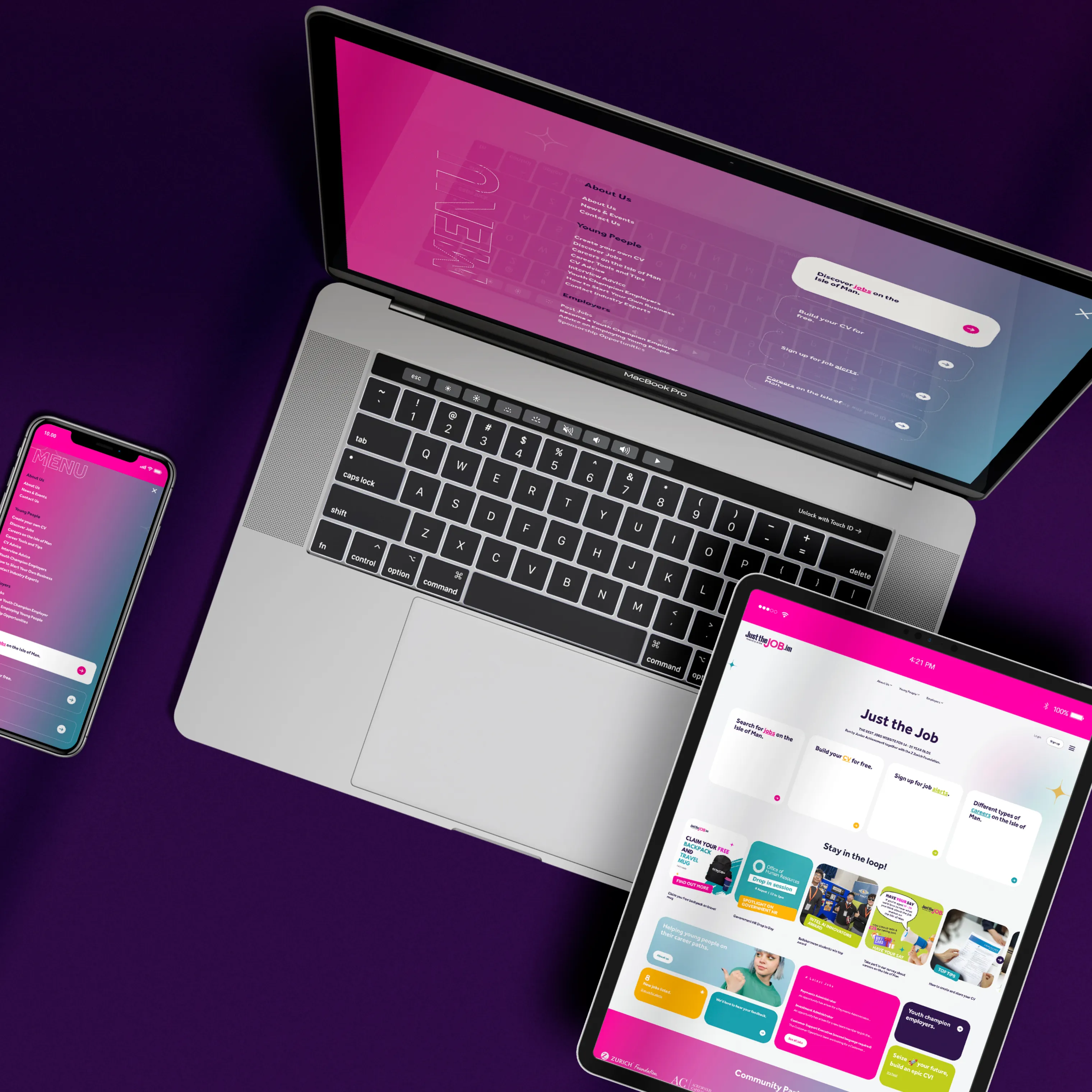 Large format mockup of laptop and smartphone displaying Just the Job platform UI on a dark background