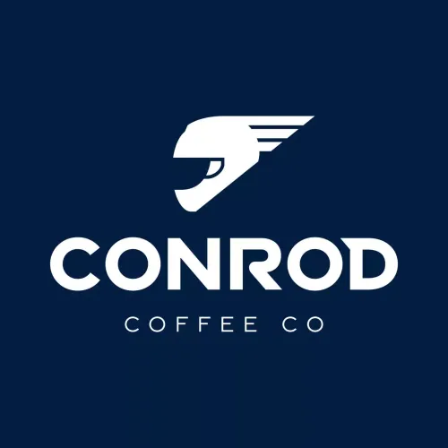 Logo of Conrod Coffee Co. features a stylized white helmet with speed lines on a dark blue background, conveying a sense of speed and modernity.