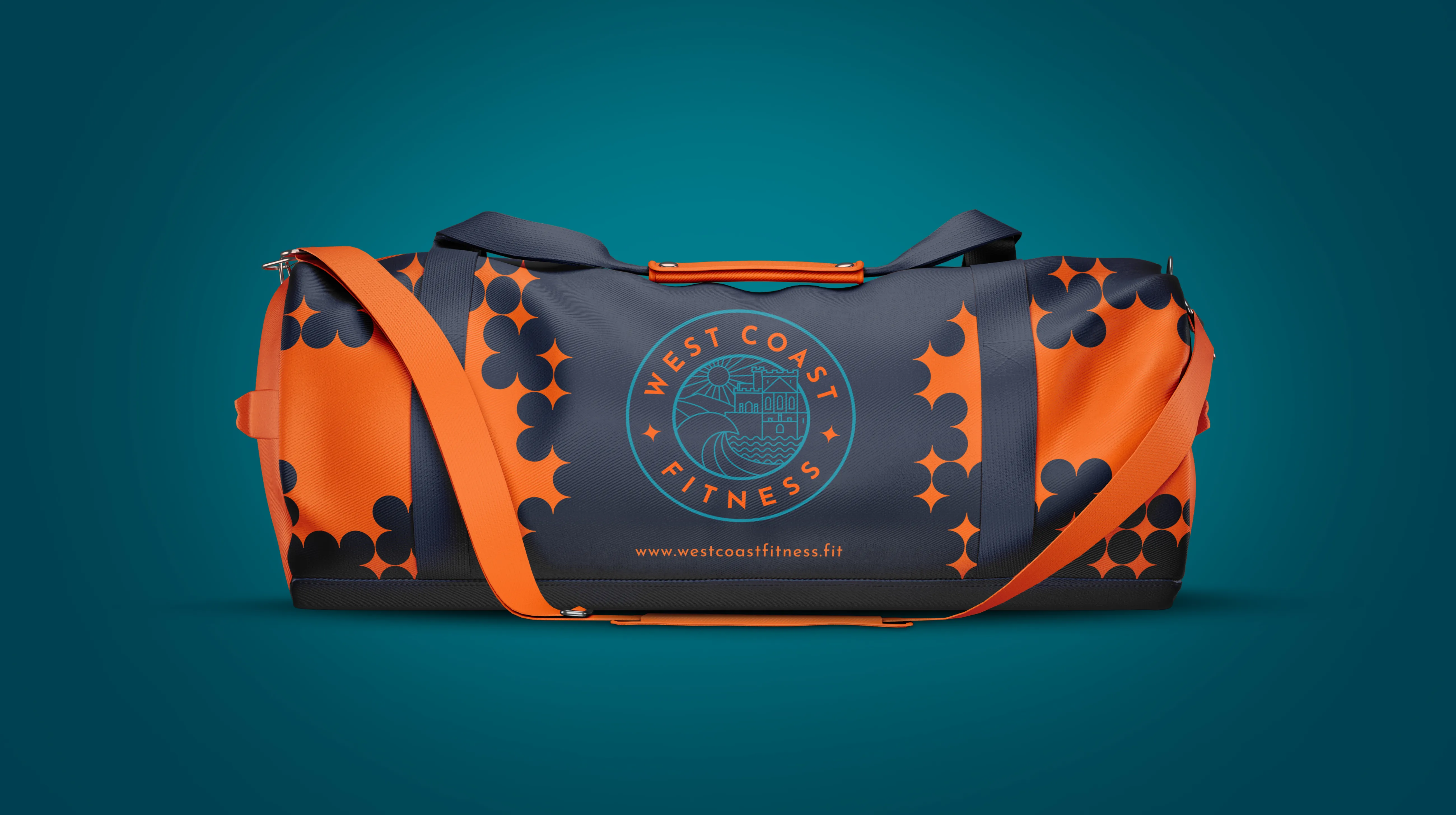 Navy and orange West Coast Fitness branded gym duffle bag with geometric pattern and circular logo on a teal background